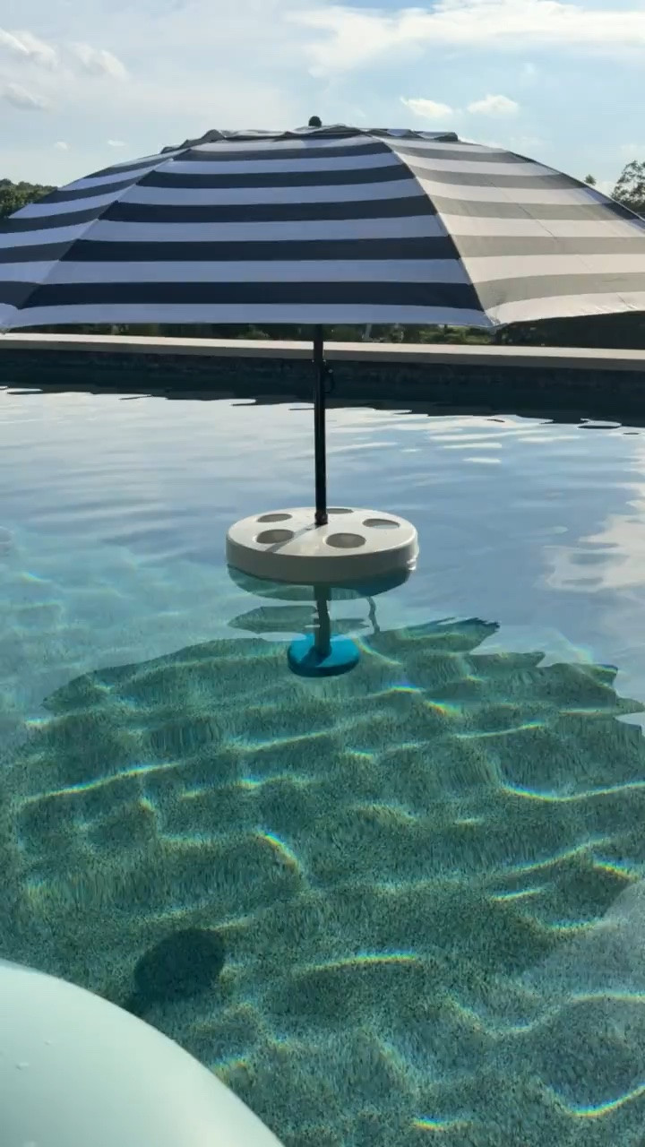 Got this pool float umbrella that holds your drinks! We don’t have any shade in our pool so this is going to be great!

#LTKHome #LTKSwim