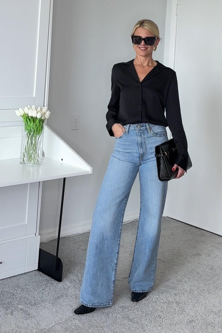 I'm 5'4.  The jeans are a little long,   They definitely need a heel.    The waist is true to size.   

Shirt true to size 

Shoes I typically wear a 7-7.5.   In Reformation I wear a 7, even in a boot.  

Bag size medium

Watch is a vintage gucci watch.    I linked some modern ones.   

#LTKSeasonal #LTKfindsunder100 #LTKshoecrush