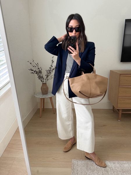 J.crew double breasted drape blazer. Love this fit and it’s perfect for petites. 

J.crew blazer petite 2
AYR tee xs
Everlane jeans 26. Cut hems. 
J.crew loafers 5
Mansur Gavriel. Color is old. 
Celine sunglasses  

Jeans, petite style, spring outfits, spring style, purse 

#LTKitbag #LTKshoecrush #LTKSeasonal