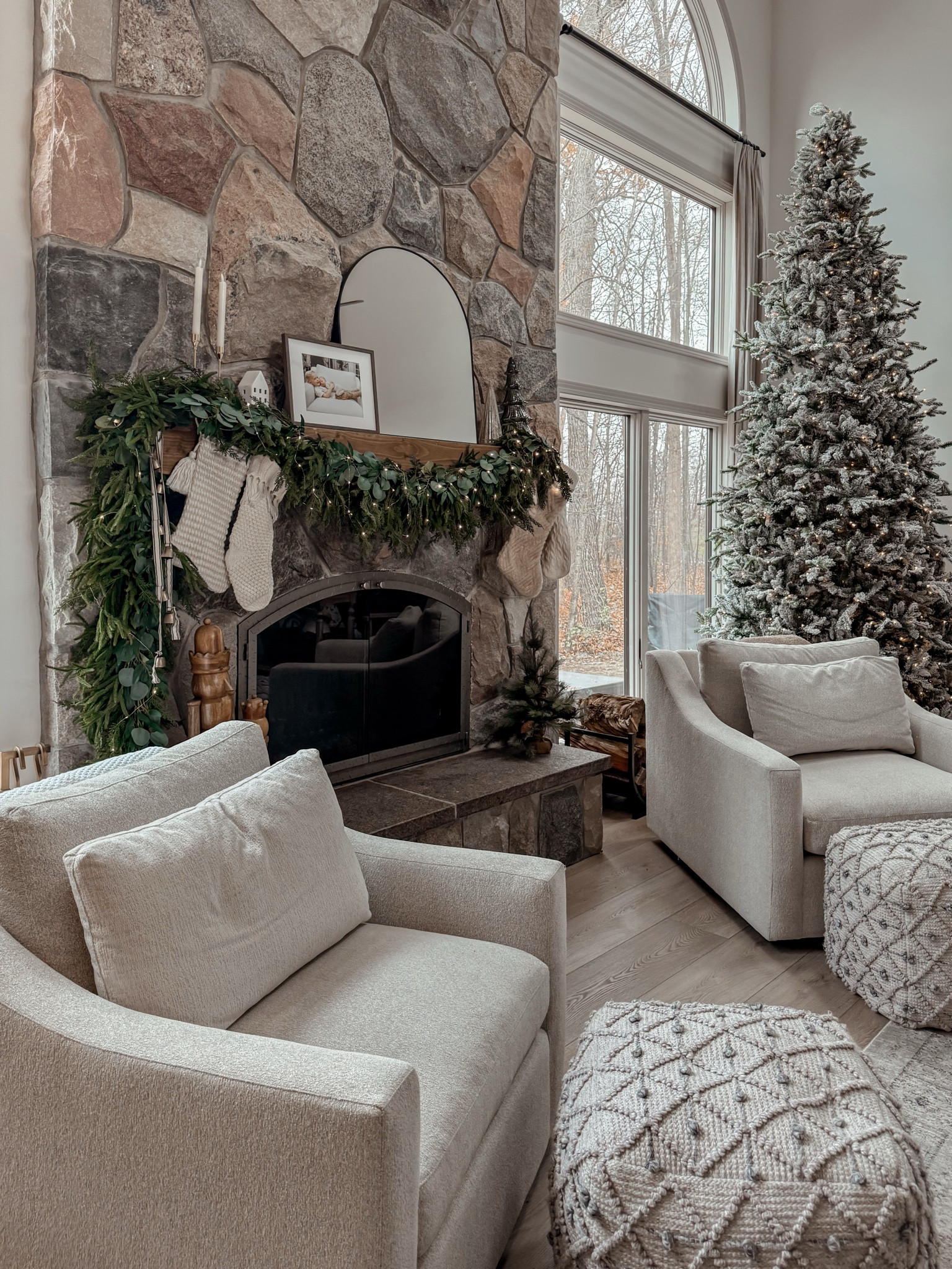 Neutral Christmas mantel decoration ideas! Wooden nutcrackers, real feel Norfolk pine garland with eucalyptus, cream knit stockings and mercury glass trees!

#LTKSeasonal #LTKHoliday #LTKHome