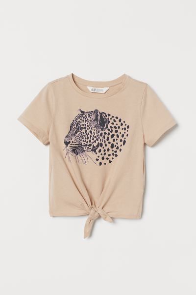 Short-sleeved top in soft cotton jersey with a printed design at front. Ties at hem. | H&M (US)