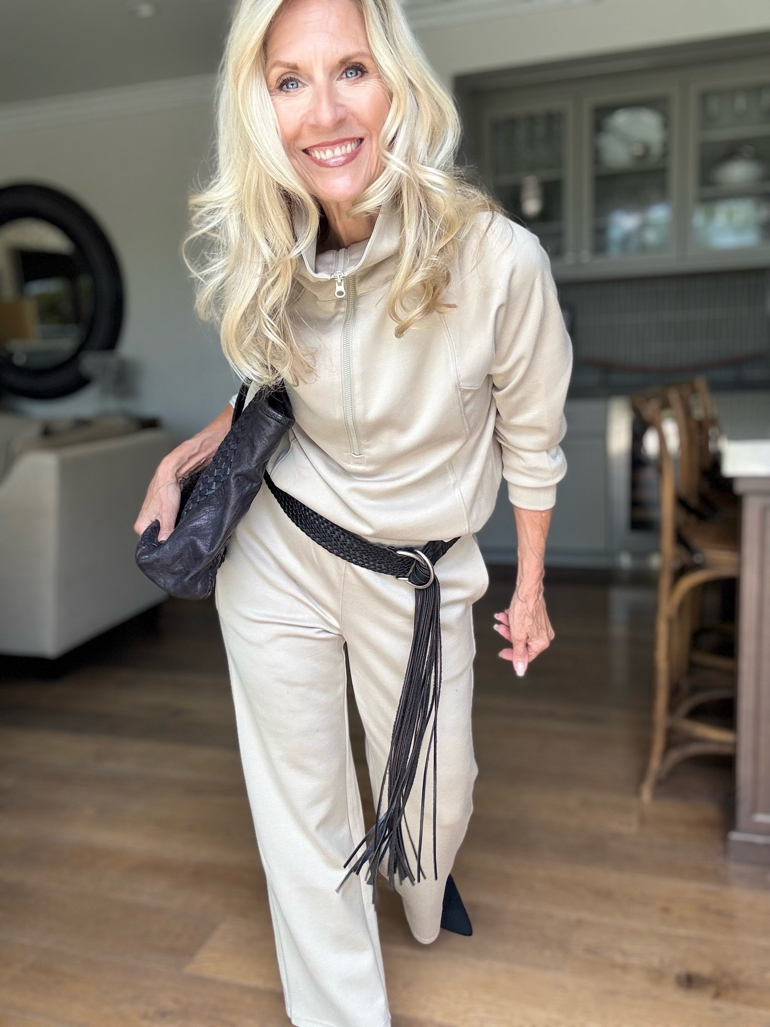 Look what 3 accessories can do with that 2 pc. travel outfit everyone has been seeing and this one’s from Amazon!

I love how an oversized woven leather bag, a fringe belt and black boots can really change the look of this set!

Follow me for more 50+ style inspiration.

#LTKootd #LTKOver40 #LTKTravel