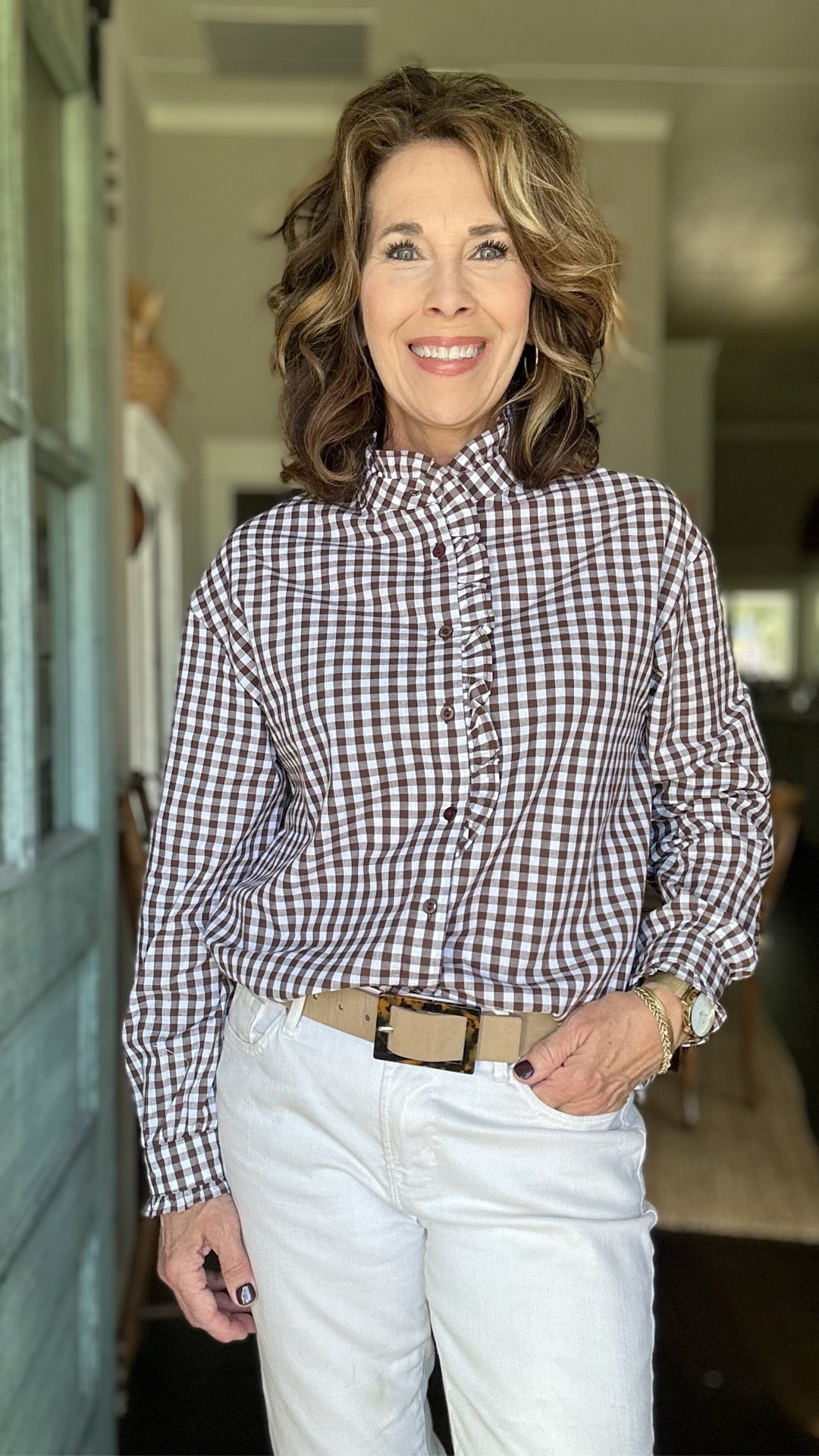 I found the cutest gingham check shirt!

It has ruffle detail around the collar, sleeves and down the front of the shirt.

Fits true to size and comes in about 10 colors, including green/white check and red/white check which would be so fun for the holidays. 

#LTKHoliday #LTKFindsUnder50 #LTKOver40
