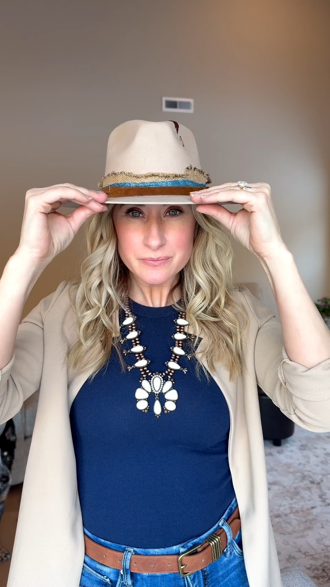 Modern western, but make it elevated 🤎

If you’ve been looking for a chic western hat that doesn’t feel costume-y… this fedora is it. The structured shape + fabric band + feather detail give it that designer-inspired feel.

Styled it with a neutral blazer, navy tank, and my white & copper squash blossom necklace for a look that works for:

• spring brunch
• concerts
• Nashville trips
• date night
• everyday western chic

Linking the exact hat + full outfit in LTK ✨ Save this for your next modern cowgirl moment.

#modernwestern #westernstyle #fedora #springoutfit #nashvillestyle #elevatedcasual #concertoutfit #womenownedstyle


#LTKSeasonal #LTKOver40 #LTKootd