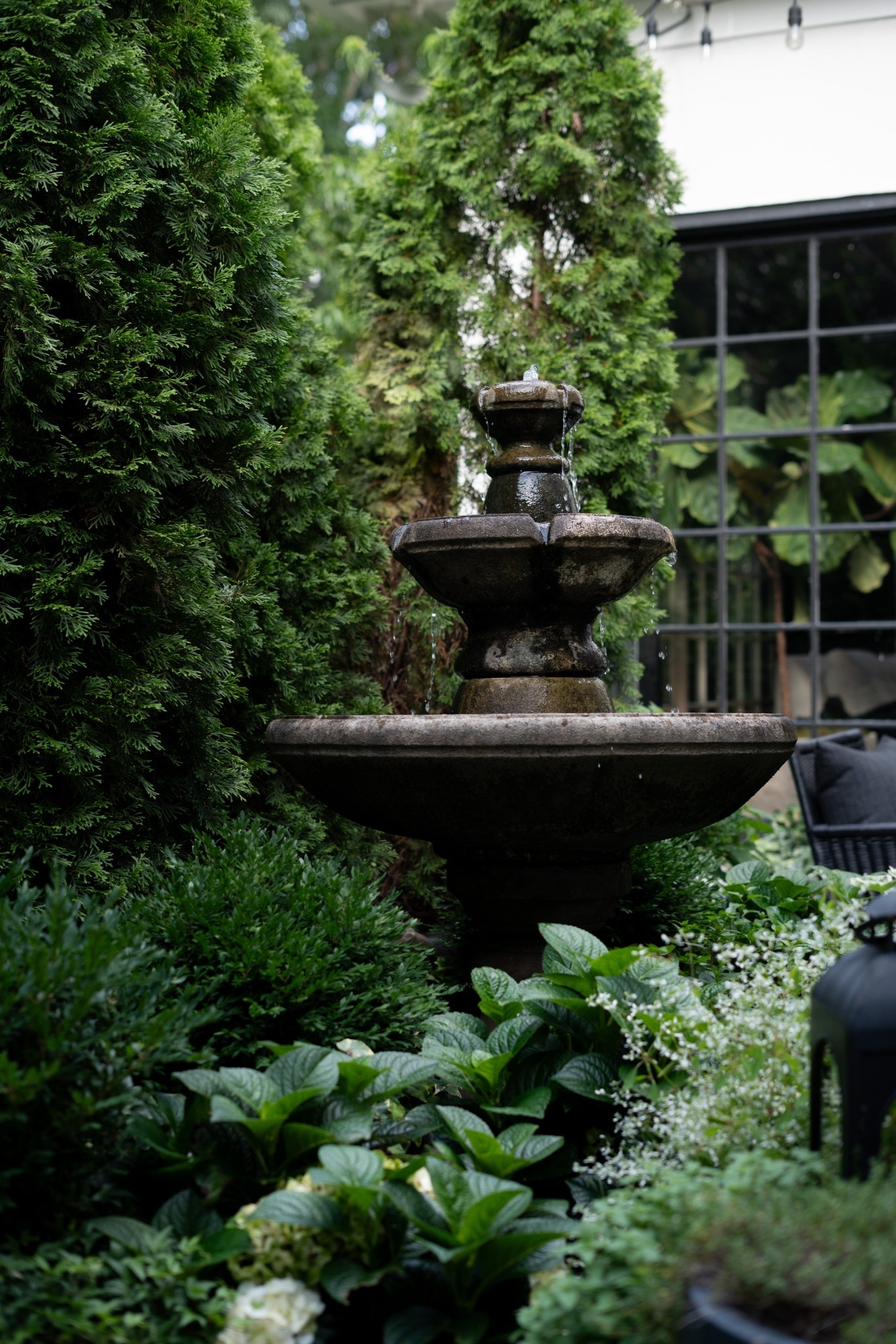 There’s just something magical about an outdoor space that feels like an extension of your home—and this patio is giving all the right vibes! I styled it with classic black and white pieces, layered in cozy textures, and brought it to life with lush greenery and topiary trees. That fountain? It adds the dreamiest sound and makes the whole space feel like a European courtyard. I even tucked in a few veggies and herbs—because why not mix gorgeous and functional? Whether you're hosting friends or sipping coffee solo, this setup is equal parts chic and comfortable.


#LTKSummerEdit #LTKHome #LTKStyleTip