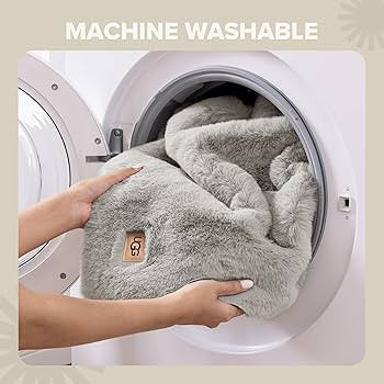 UGG Euphoria Faux Fur Throw Blanket, Oversized Warm Throw for Couch or Chair, Luxury Bedroom Deco... | Amazon (US)