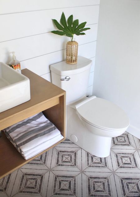 Summer decor pool bath styling 
Neutral modern patterned tiles 
Striped beach towels 
Gray and white 
Vanity sink 
Skirted toilet 

#LTKsalealert #LTKhome #LTKfindsunder100