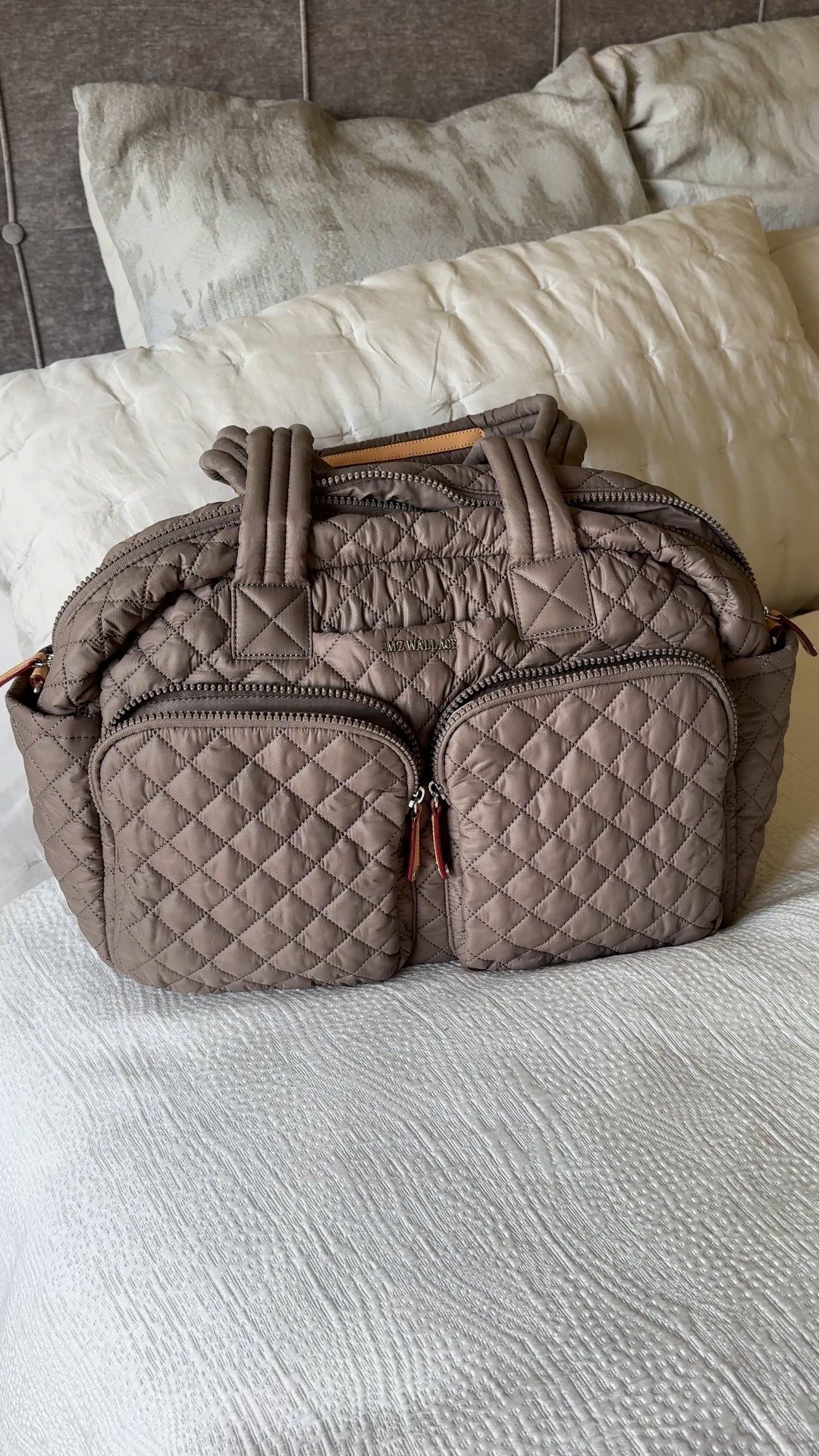 Chic & functional travel bag. If you are in the market for a new one, I highly recommend this nee style that looks good and works out perfectly for travel. 
- Lightweight, well thought out organizational details, can fit under airplane seat. 
- Shoulder or crossbody carry; plus sleeve to put on top of rolling luggage. 
- Quality of bag is excellent. 
- Available in multiple colors; exact color here is morning dove. 
- Travel outfit: athleisure style. 
- Travel shoes: comfy sneakers. 
- Mini bag is a convertible bag that I’ve used for recent vacations. 


#LTKTravel #LTKItBag #LTKOver40