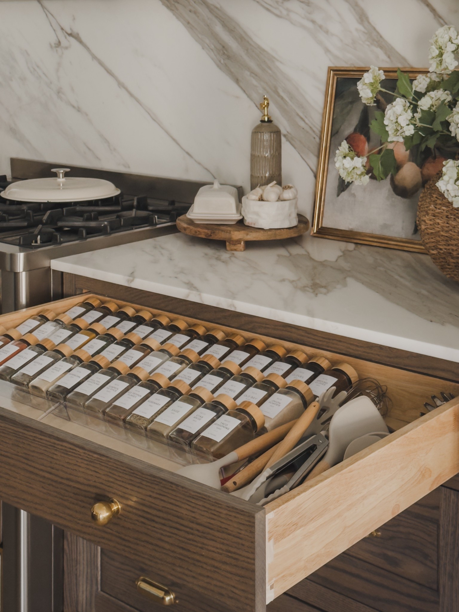 Some of my favorite organization finds include this aesthetic spice rack and jars for an oversized drawer. I love when aesthetic meets function - including all things organization!

Home finds, neutral home inspo, organization details, aesthetic home, neutral home inspo, kitchen views, timeless kitchen details, spice rack organization, kitchen utensils, marble countertop, faux florals, digital art, vintage style frame, Etsy, found it on Amazon, shop the look!

#LTKHome #LTKSeasonal