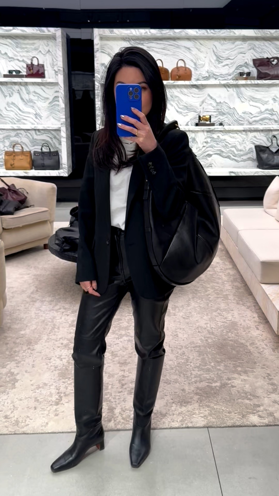 Tried on the new Mombosa bag by Saint Laurent. It’s quite the work of art. There is a wooden detailed bar on the strap that has to be angled down when you put it on your shoulder to get the exact right look. Perfection. 

#LTKbag #LTKworkwear #LTKstyletip