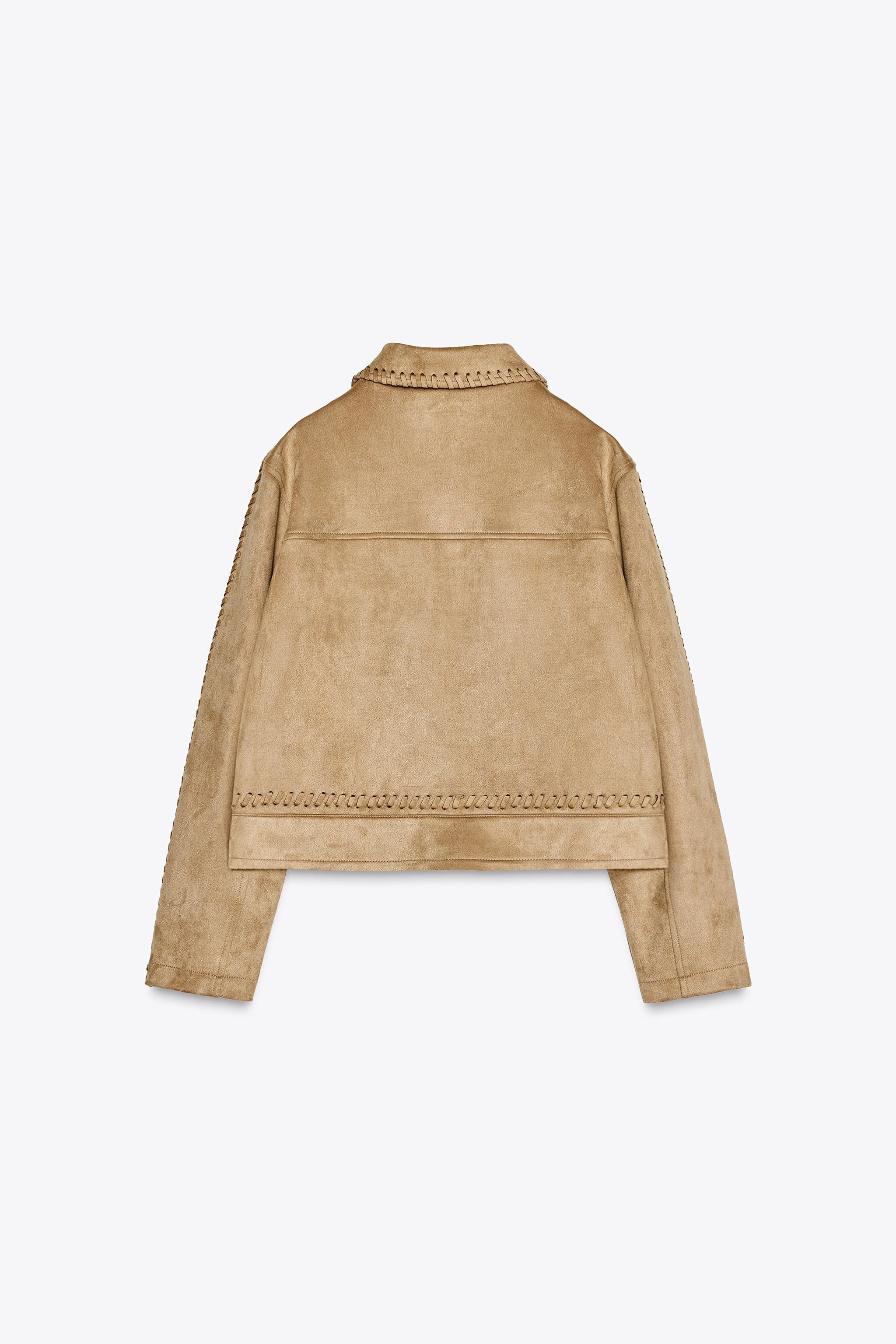 Collared, long sleeve jacket. Featuring front flaps and braided trims. Front pockets. Button fast... | Zara UK