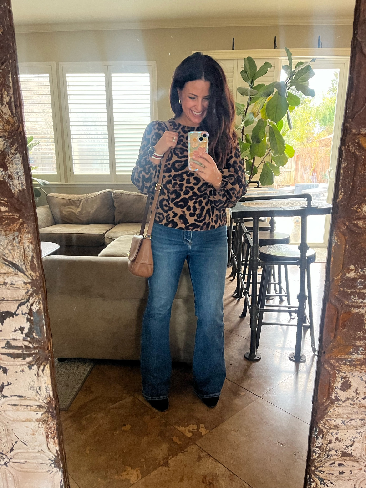 Fun leopard top and flare jeans for an impromptu wine tasting date with the Mr. 



#LTKStyleTip #LTKOver40 #LTKPetite