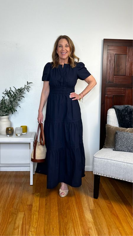 I just tried this Quince dress and love it! It's navy, fits tts.  I’m wearing an xs. It's a maxi dress, but I think
I'll shorten it a couple of inches.   

Wear this to a party, casual wedding, or wine tasting! 