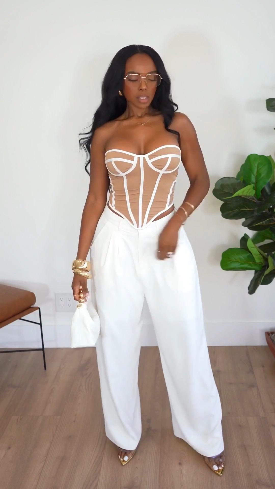 Hi Babes!

Okay this look is giving luxury vacation meets modern elegance. The corset-style top paired with the flowing white trousers is such a stunning combination, and it looks far more expensive than it actually is.

The top is beautifully structured and creates the most flattering silhouette, while the wide-leg trousers balance everything perfectly. I love how the neutral tones keep the look sophisticated, feminine, and effortlessly chic.

Where to wear this:
• Rooftop dinners
• Vacation evenings
• Date nights
• Birthday celebrations
• Summer events and special occasions

Accessories:
The white mini bag and gold heels are the perfect finishing touches. Together they create that polished, designer-inspired look without feeling overdone.

Everything is linked below

xx Kira | IG: KirasFashionFinds

34D - 27 - 40 • Size Small or 4

#LTKgrwm #LTKootd #LTKvlog