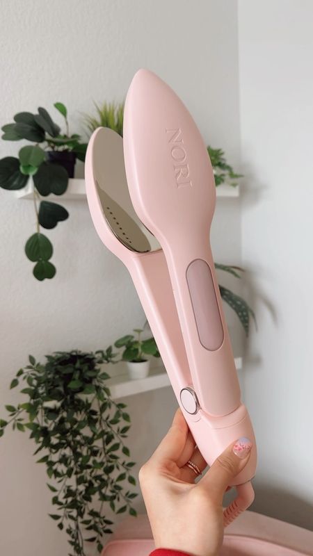 The Nori Press in pink! The viral steam iron that requires no ironing board and is an easy way to remove all wrinkles from your clothing ✨ Features an optional steam feature so the device can work as a steamer, an iron, and a steam iron. It also works on all fabrics and has six fabric-specific heat settings 

#LTKhome #LTKstyletip #LTKmidsize