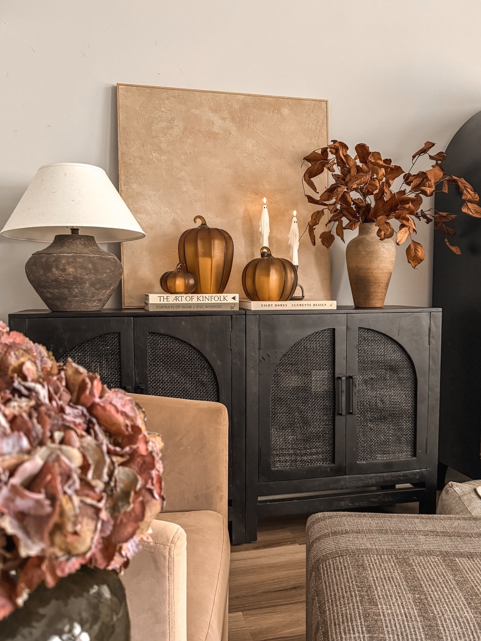 A little moody, a little vintage, & a whole lot of cozy! 🍂

Fall living room decor, cozy fall home decor, fall cabinet styling, amber glass pumpkins, elevated fall decor, vintage inspired fall decor, neutral fall decorating ideas, cozy cottage home decor, moody fall aesthetic, rustic fall stems, fall floral arrangements, black accent cabinet, fall console table decor, warm neutral living room, flameless taper candles, vintage style table lamp, autumn home styling, organic modern fall decor, timeless seasonal decor