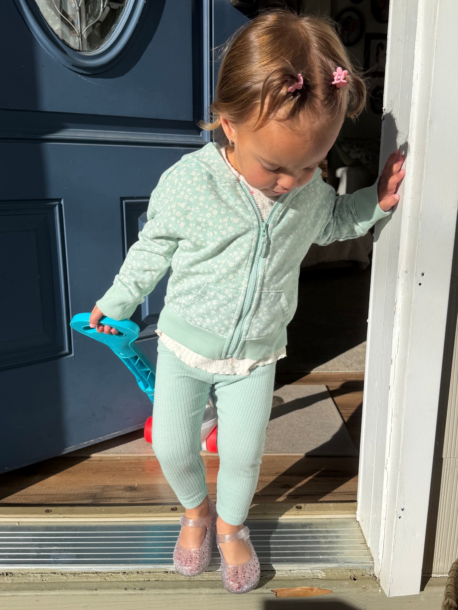 Wearing 18-24m in clothes and size 4 in shoes. All runs true to sizee