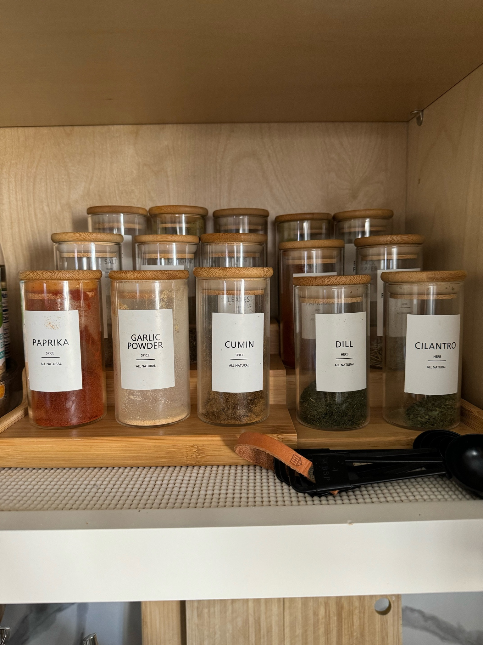 Spice jars 
Kitchen organization 
Spice labels 
Organization ideas 

#LTKhome #LTKfindsunder100 #LTKfamily