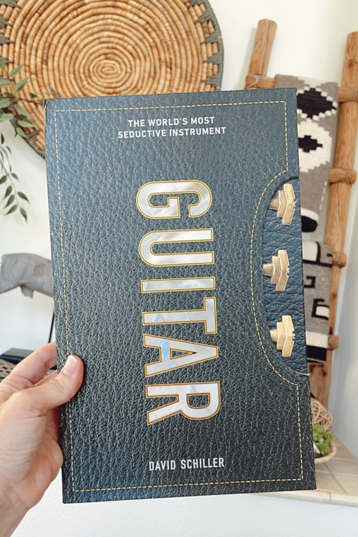 This would make a really nice gift for a guitar lover PLUS it’s really beautiful so also makes a nice coffee table book! 

#book #guitar #music #hardcover #amazonfinds #coffeetablebook #coffeetabledecor

#LTKfindsunder50 #LTKGiftGuide #LTKhome