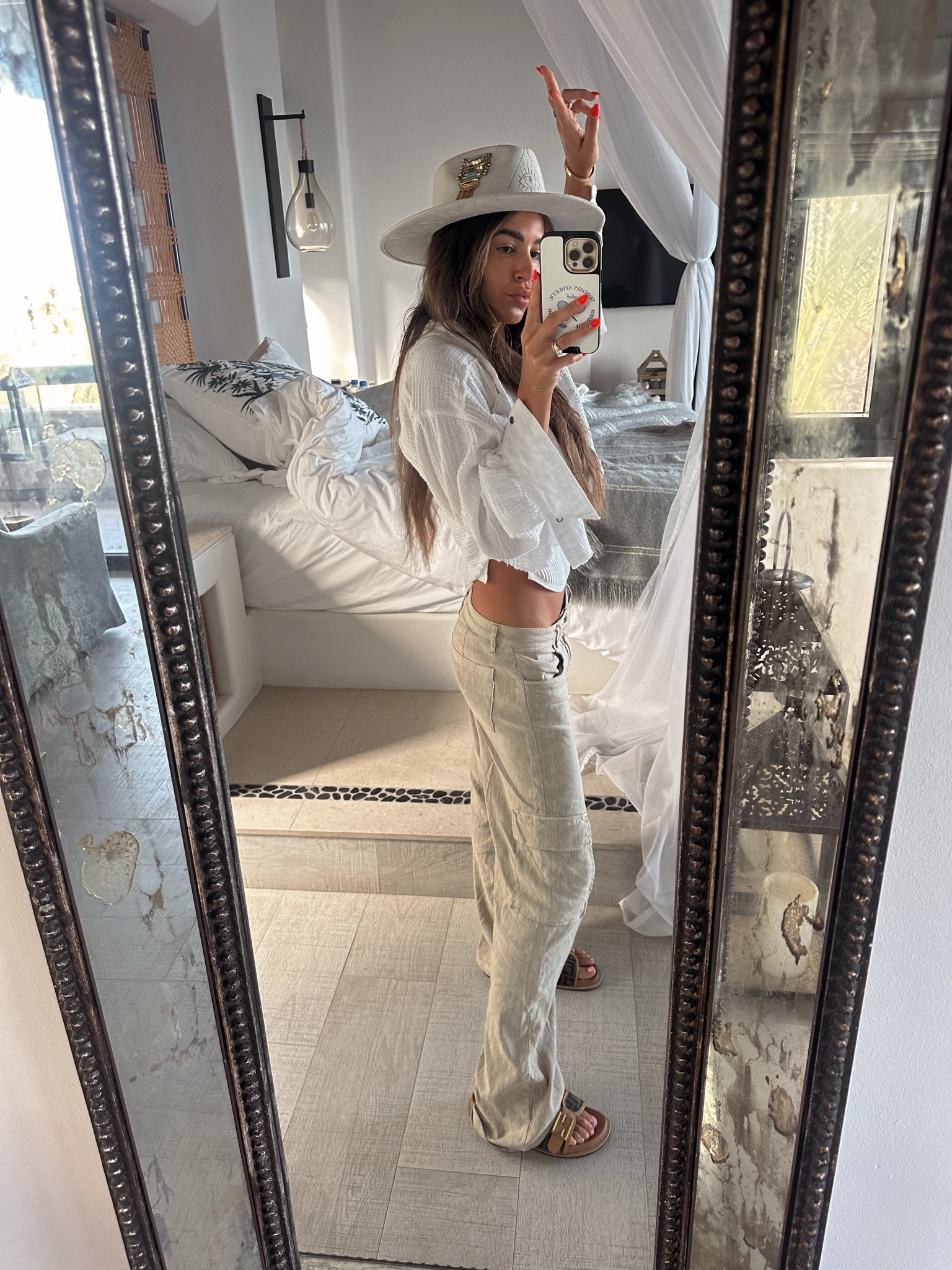 Literally, I have never received more compliments on a pair of pants in my entire life. These linen cargo from cut from the cloth are the perfect in between beige and olive I have ever seen. I’ve never seen anything like them. They’re so comfortable they sit perfectly on your waist and, I have never received more compliments like ever. I wore them on the plane to Cabo and on the way home from Cabo that’s how comfortable they are and then the linen top that has a fringed edge. Bottom is so cute and it’s button up. I’m wearing the small.