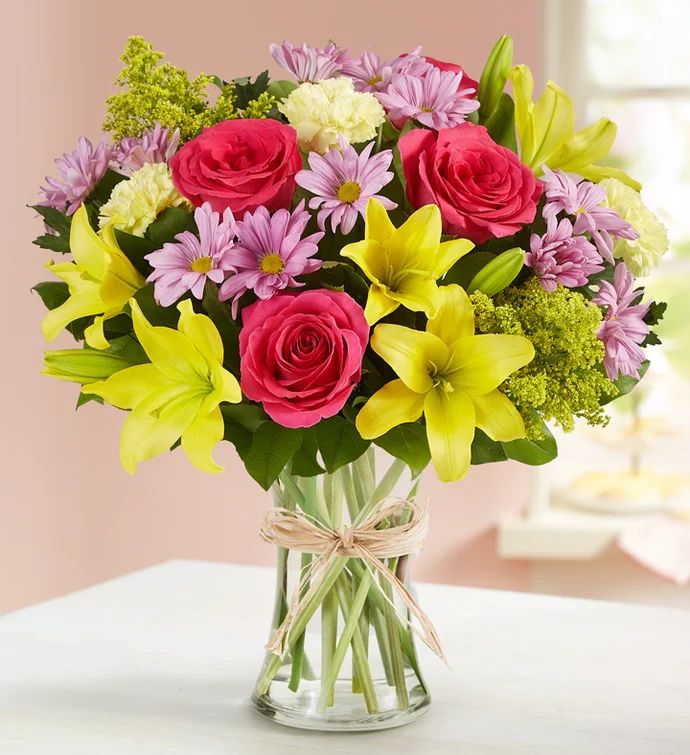 Mom is in for a beautiful surprise! Our best-selling Mother’s Day arrangement is designed in th... | 1800flowers.com