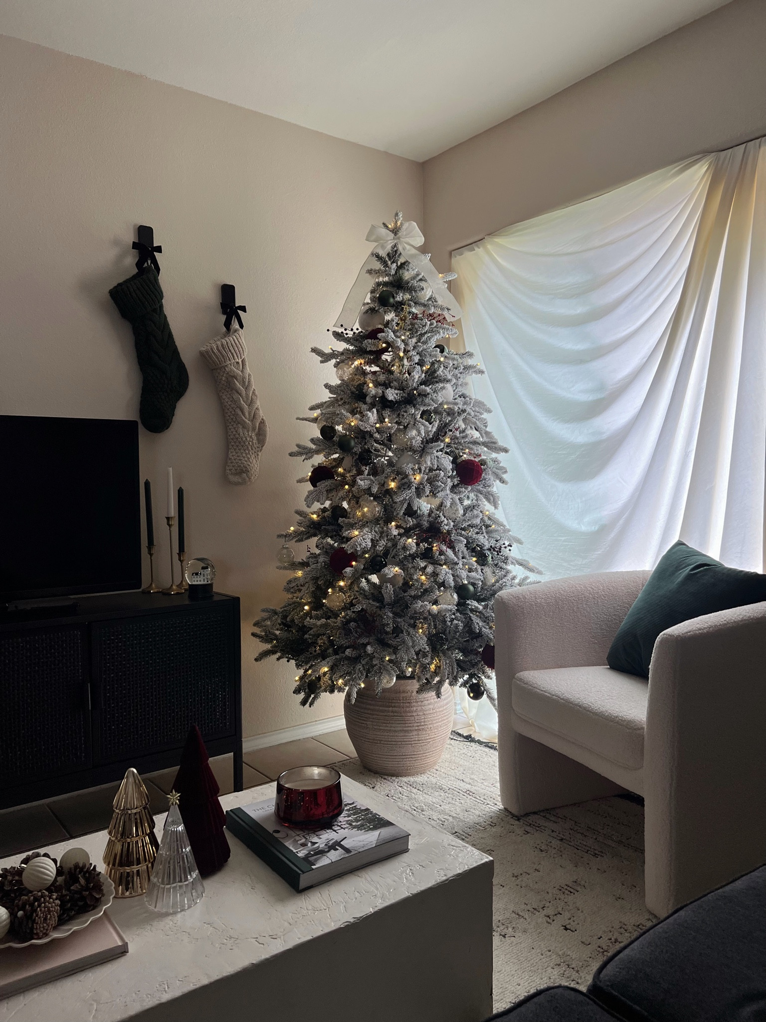 This is my favorite holiday corner in my home! I spray painted the command strips matte black and the stockings are from Ross so I’m not sure the brand 🥺 go check your local Ross 

#LTKhome #LTKSeasonal #LTKHoliday