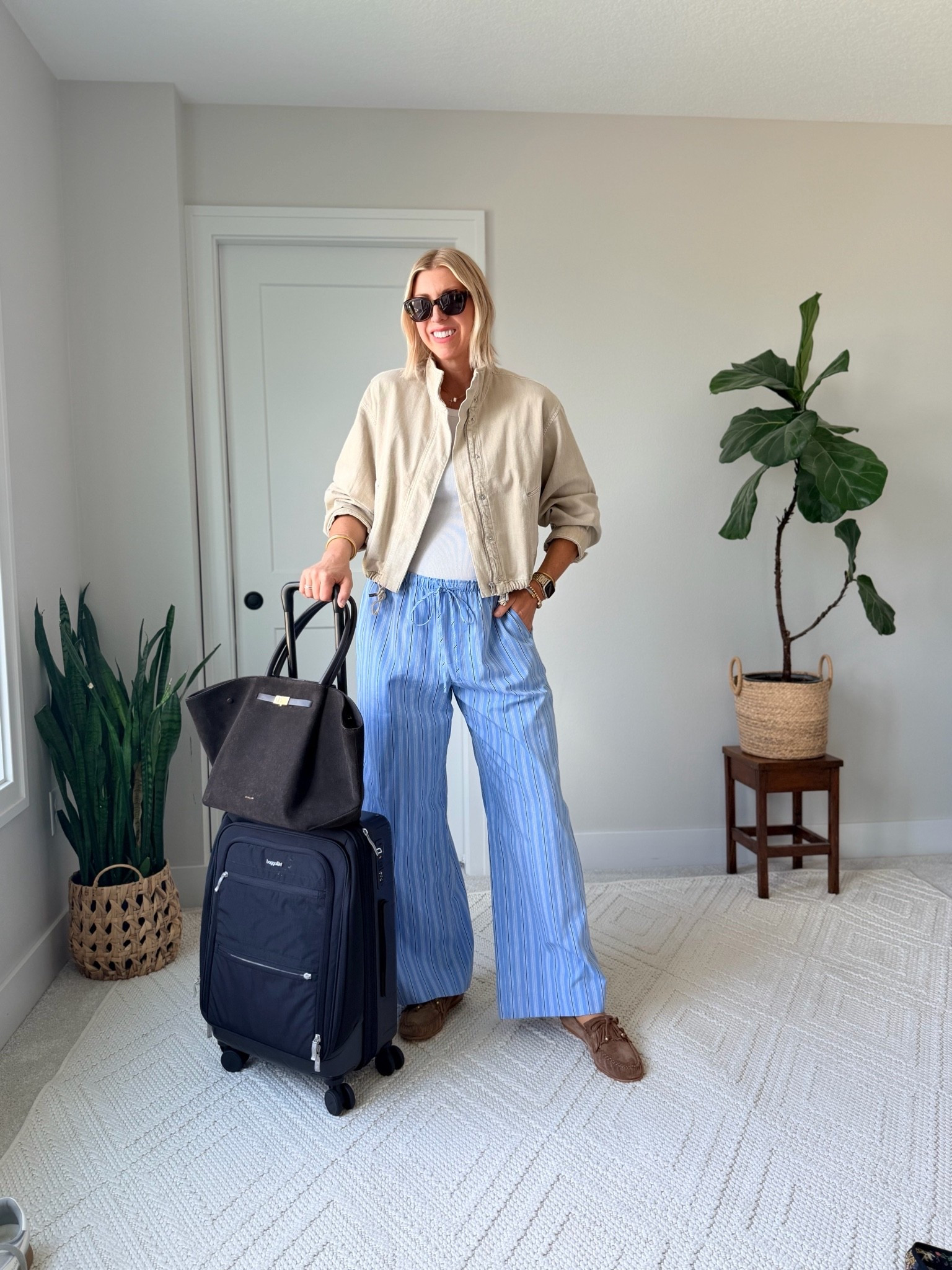 Your airport outfit doesn’t have to choose between comfortable and put together.

This is my go-to summer travel formula: soft wide-leg pants, a cotton tank, a lightweight layer, an easy loafer, and a roomy tote.

Breathable fabrics, relaxed silhouettes, and one structured piece make all the difference when you want to feel comfortable but still look styled when you land.

Linking the full look here — perfect for travel days, casual dinners, and capsule wardrobe pieces you’ll actually wear on repeat.

#LTKootd #LTKOver40 #LTKTravel