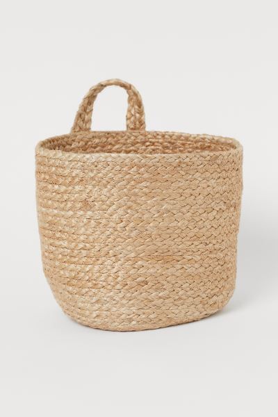 Large, handmade storage basket in braided jute to hang on a wall. Loop at top for hanging. Height... | H&M (US + CA)