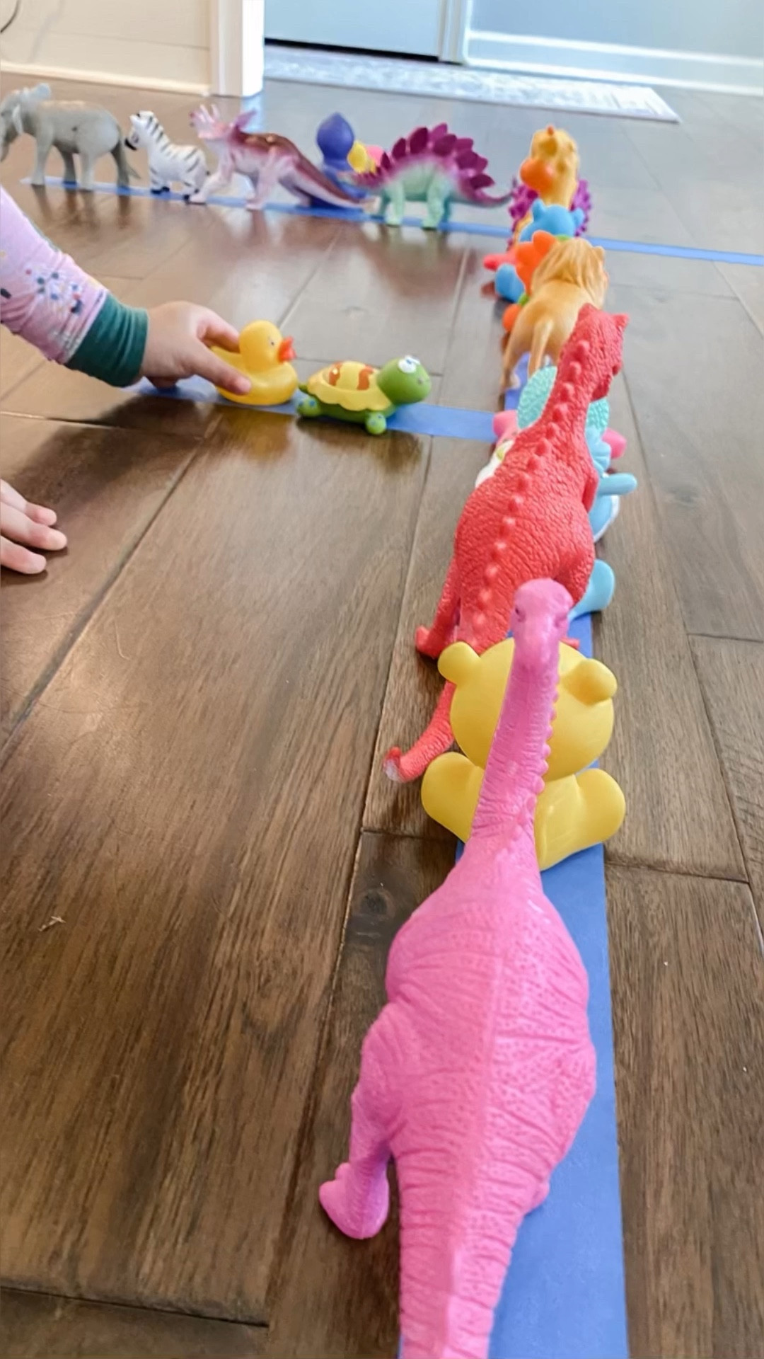 Animal Line-Up, the simplest toddler and preschool activity ever. All you need is painters tape and lots of animal figurines! How easy is this?! 👏🏼

#LTKfamily #LTKhome #LTKkids