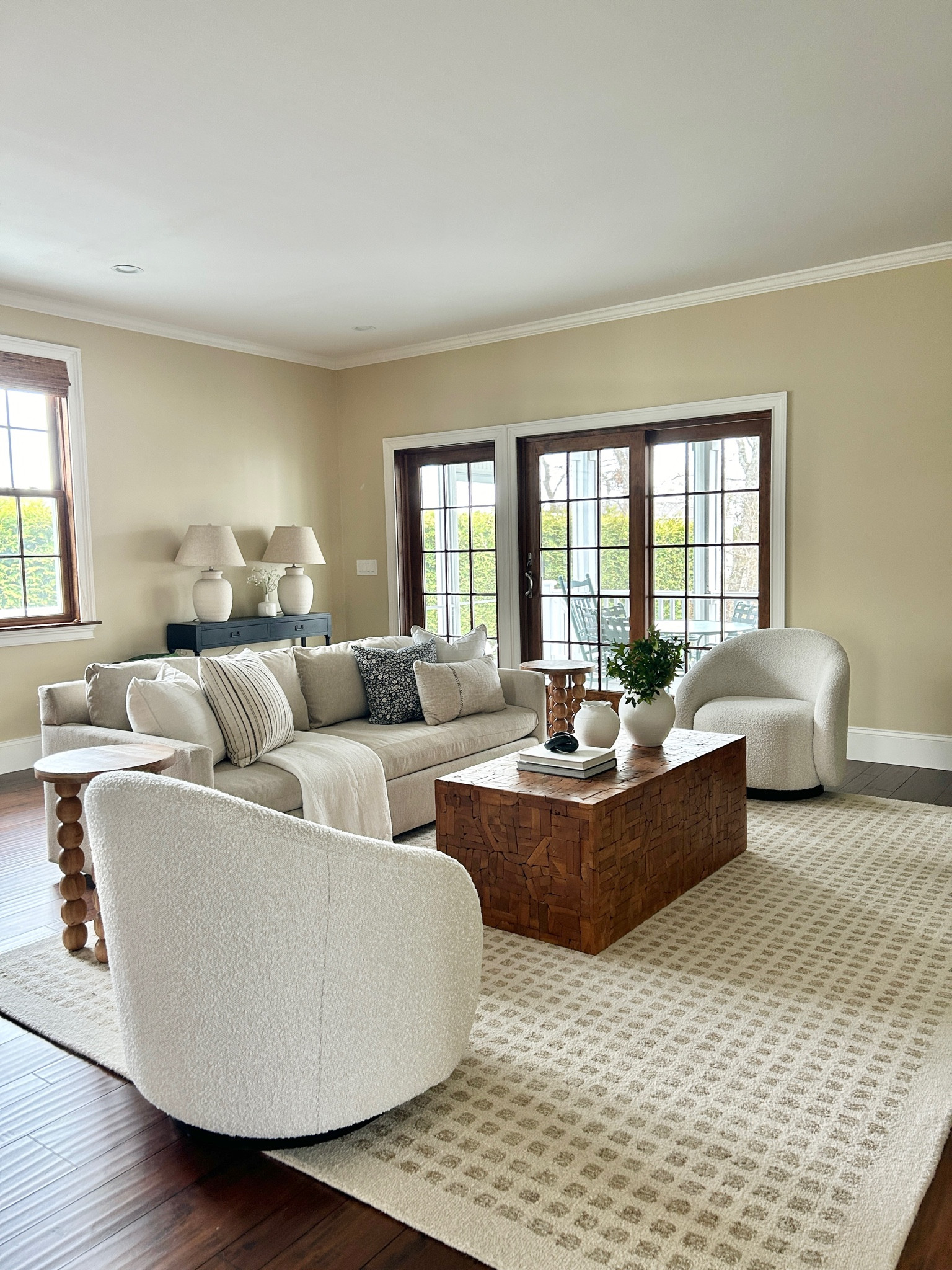 Neutral transitional living room.  West elm sofa, Loloi rug, swivel chairs.

#livingroom

#LTKHome