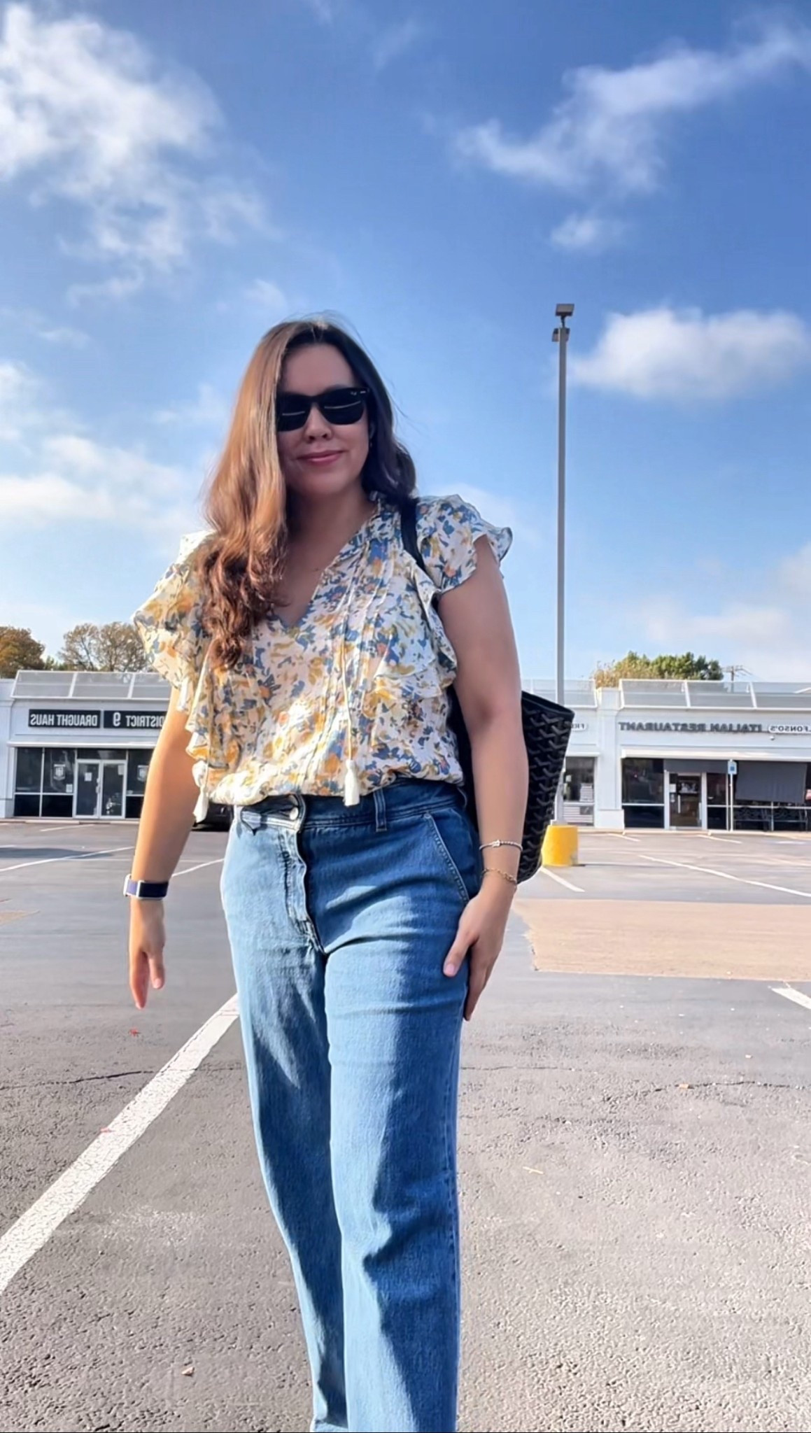 Easy mom on the go style 
Flowy top with flutter sleeves - on sale under $70 
Petite size denim, true to size and no hemming needed 
Chloe Lauren scallop flats 
Ray ban wayfarer sunglasses 
Goyard Artois tote 


#LTKmomlife #LTKSaleAlert