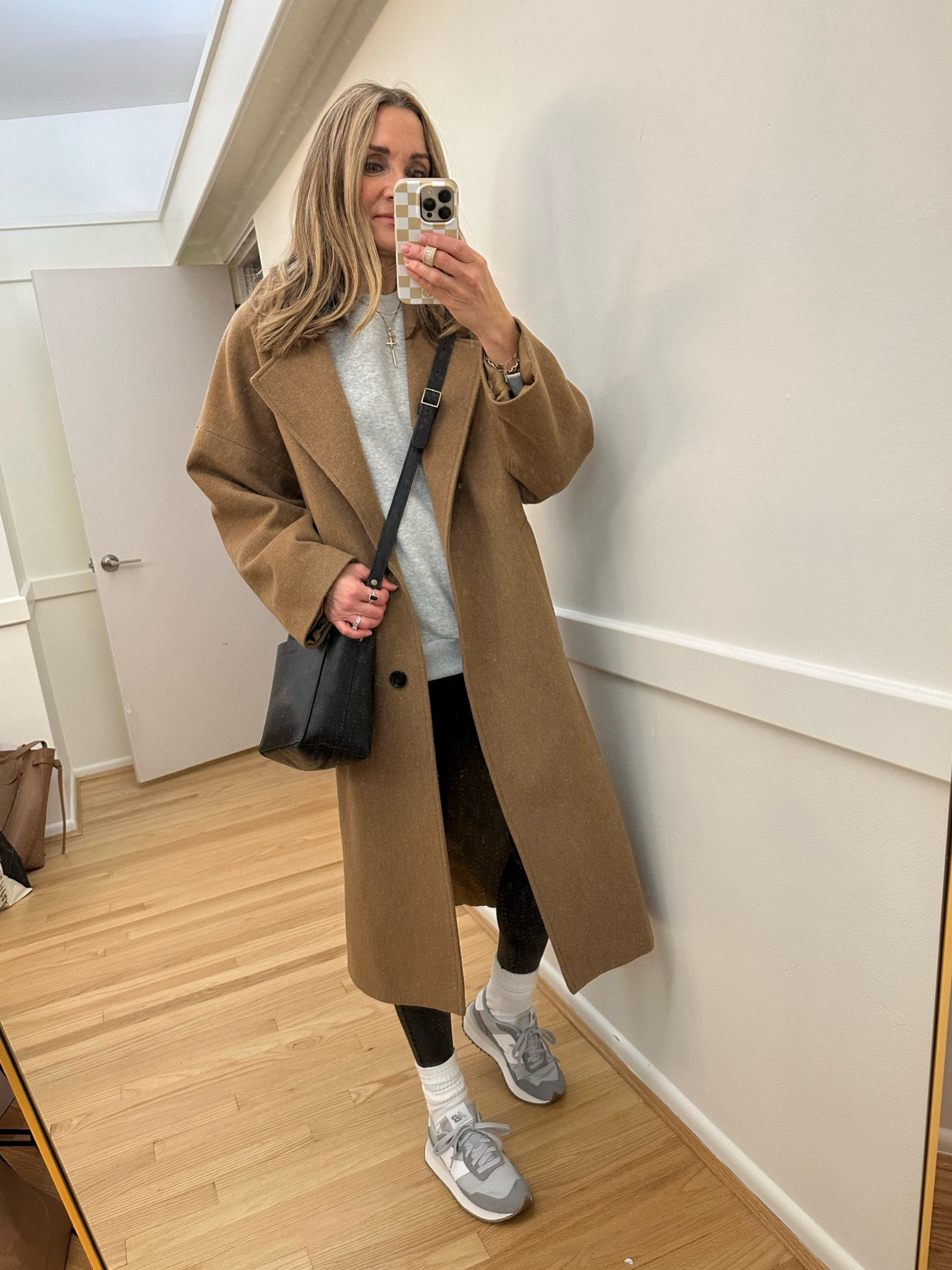 Weekend casual winter outfit! Long wool camel coat with Spanx faux leather leggings and new balance sneakers. Styled with gray oversized sweatshirt and Portland Leather mini crossbody black bag

#LTKover40 #LTKstyletip #LTKfindsunder100