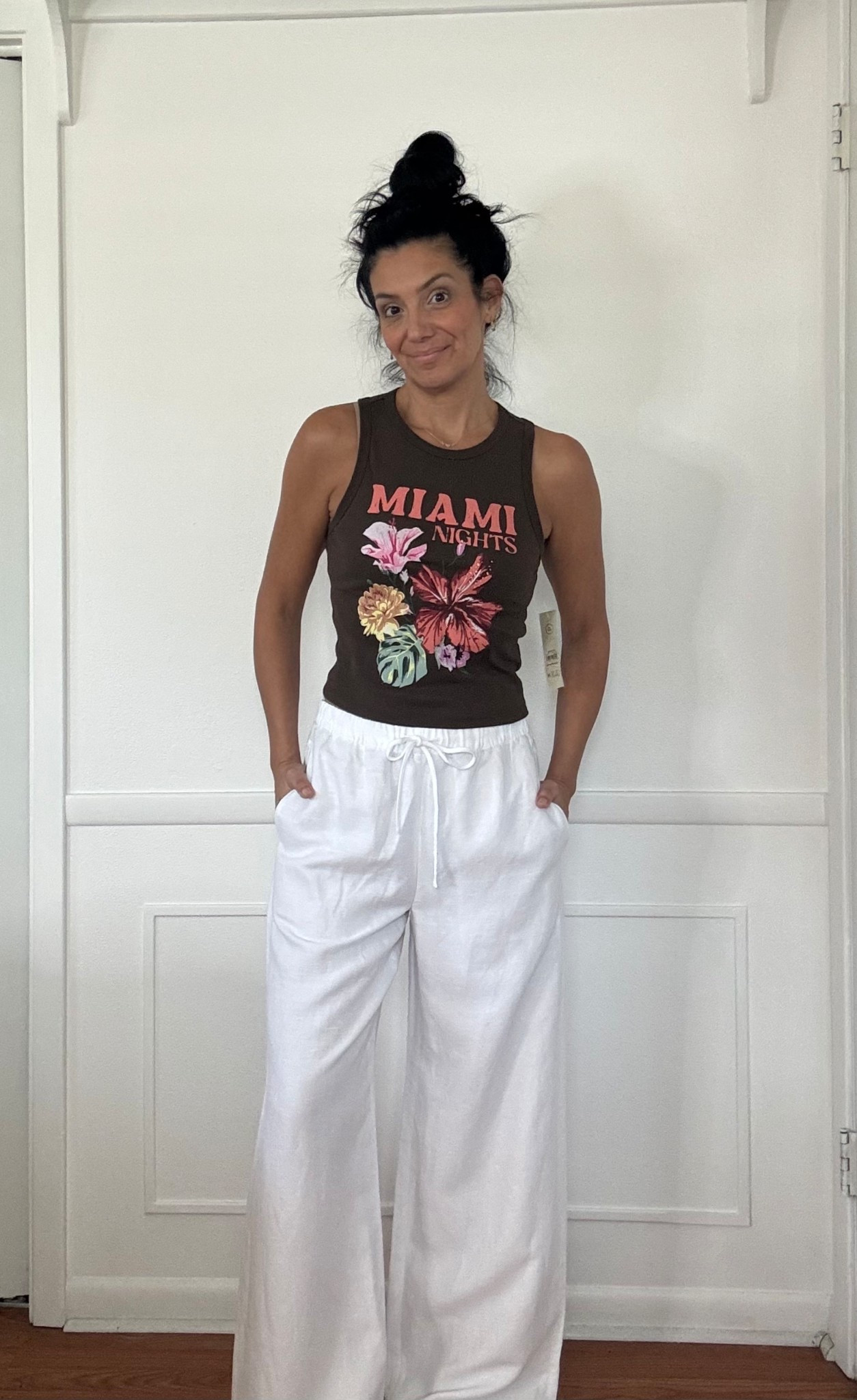 Don’t mind the hair I imagine this is what it would look like after being on the beach and having it blown all over the place

This tank is from Walmart. It’s under eight dollars. I think it’s like 6.98. I got a size extra small. There’s a little bit of stretch, I don’t have any boobs so that’s why I can go so small. ￼