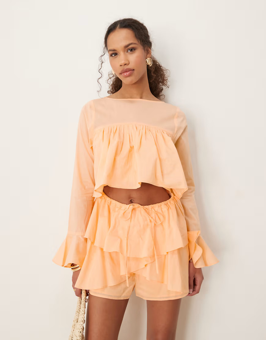 ASOS DESIGN cotton ruffle cutout romper in peach-Orange | ASOS (Global)