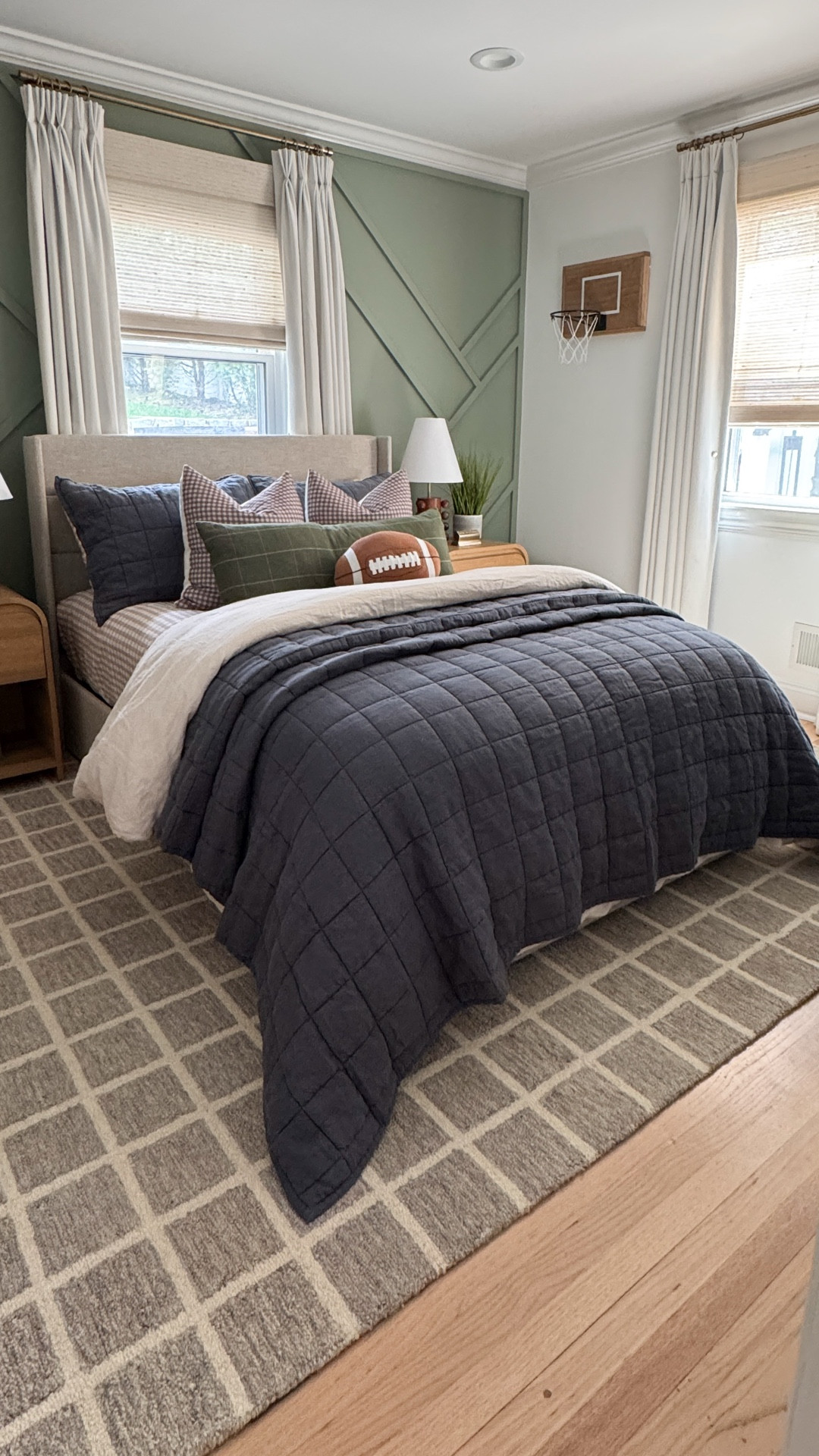 I can’t believe Ryan’s big room refresh is finally here 🏈🤎. 
He’s been asking for a cozy, playful space and this transformation might just be my favorite yet. From the new accent wall color to the layered bedding and that little football touch, he’s completely in love with his new room and I’m swooning with how everything came together. 

#roommakeover #kidsroomdecor #football #kidsbedroom #boysbedroom #boysbedroomdecor

#LTKFindsUnder100 #LTKStyleTip #LTKHome