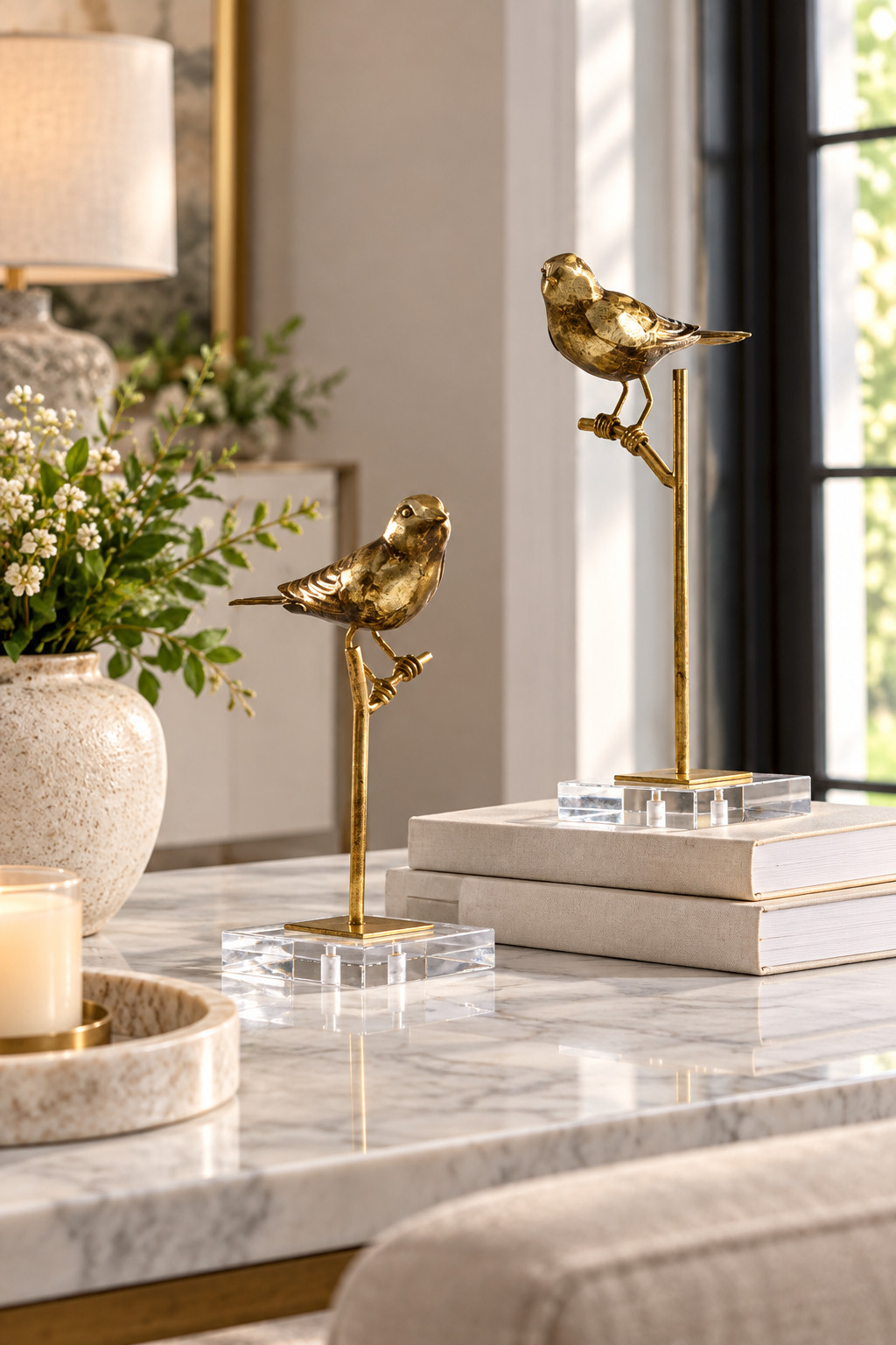 Okay these little gold bird sculptures are such a pretty home decor find ✨ I love how they instantly make a console table, coffee table, or bookshelf feel a little more elevated without looking too fancy. The antique gold finish with the clear acrylic bases is so chic, and they’re perfect layered with neutral books, candles, marble, and a little greenery. Such an easy way to add a polished designer touch to a living room or entryway. 🤎
#BirchLane #BirchLaneFinds #HomeDecorFinds #GoldDecor #BirdDecor #BirdSculpture #DecorativeObjects #ShelfDecor #ConsoleTableDecor #CoffeeTableDecor #LivingRoomDecor #EntrywayDecor #NeutralHomeDecor #LuxuryHomeDecor #ModernClassicDecor #HomeStyling #InteriorDecor #DecorInspo #DesignerHomeDecor #HomeDecorIdeas 

 #LTKSeasonal #LTKHome #LTKSaleAlert
