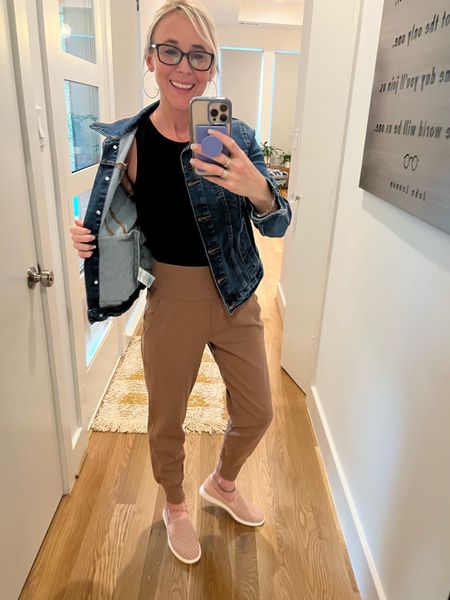 I love that this Jean jacket can be worn with so much stuff and is under $20! 🙌 These Athleta joggers are the best and I think worth the cost. They are really comfy and  can be dressed up or down. Sizing details below. 

Jean jacket - wearing a size small and runs true to size, but if you’re between sizes, I’d size up. 

Black bodysuit - wearing a size small and runs true to size. 

Joggers - wearing a size XS. I think these run a bit big, so I’d size down.

Shoes - wearing an 8 1/2 and I think these run true to size. 

#LTKstyletip #LTKunder50 #LTKfit
