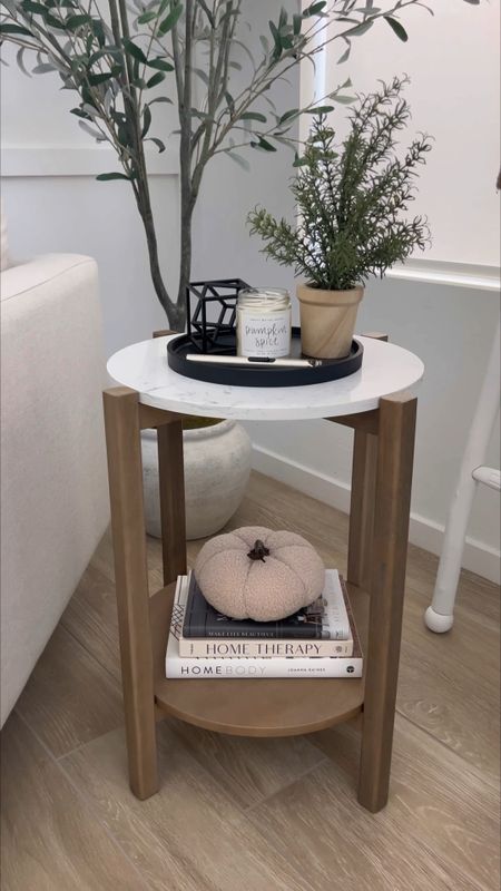 Fall Home decor!! Side table decoration is in our living room. Everything is Walmart or Amazon. Affordable home decor books,  clean candle, pumpkin, and faux tree

#LTKfindsunder100 #LTKhome #LTKSeasonal