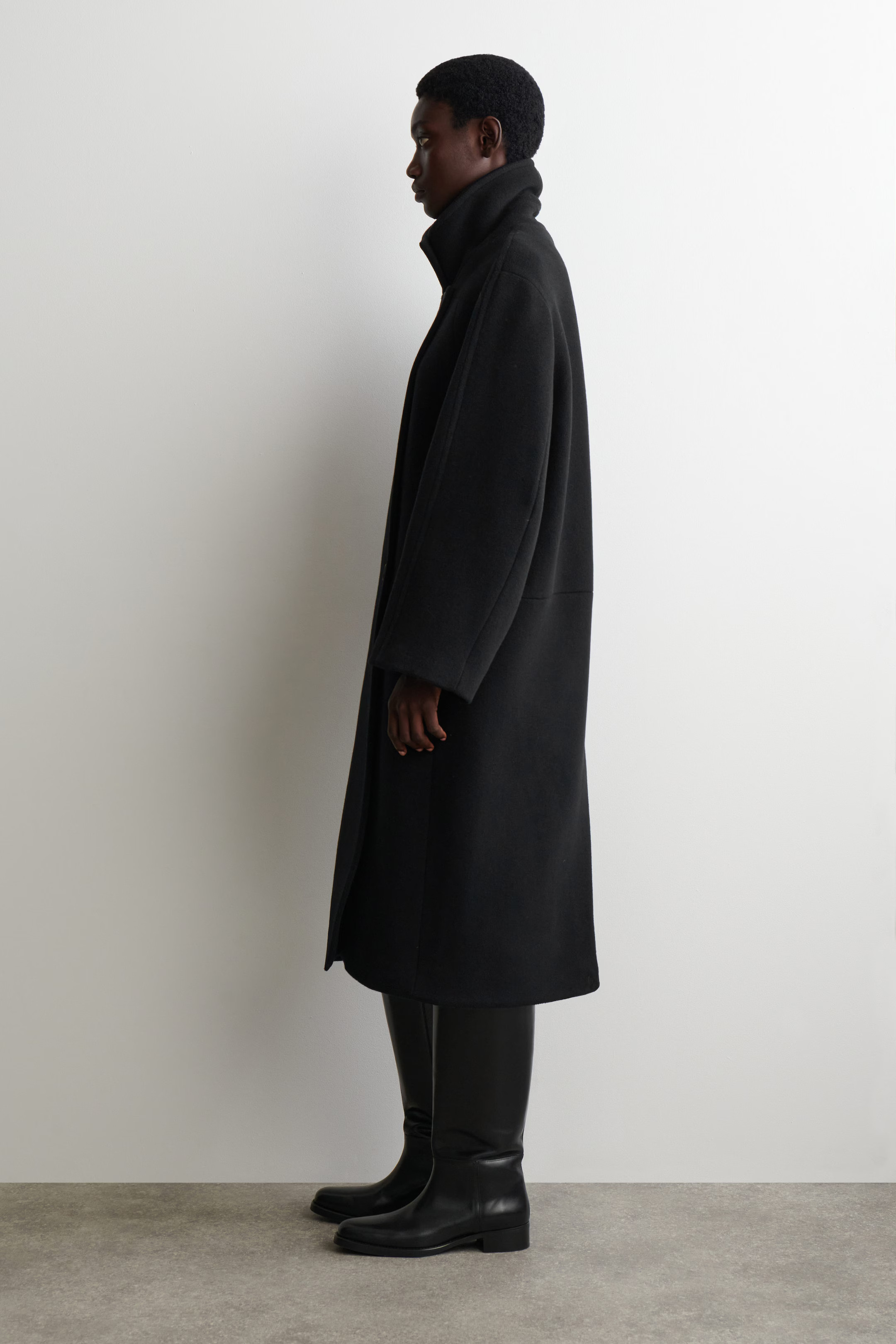 OVERSIZED DOUBLE-BREASTED WOOL LONG COAT - BLACK | COS GB | COS UK