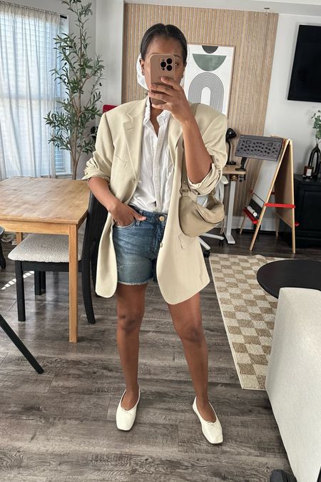 Oversized blazer with white button down skirt and high waist denim shorts. White ballet flats. Minimalist casual outfit 

#LTKStyleTip #LTKFindsUnder100