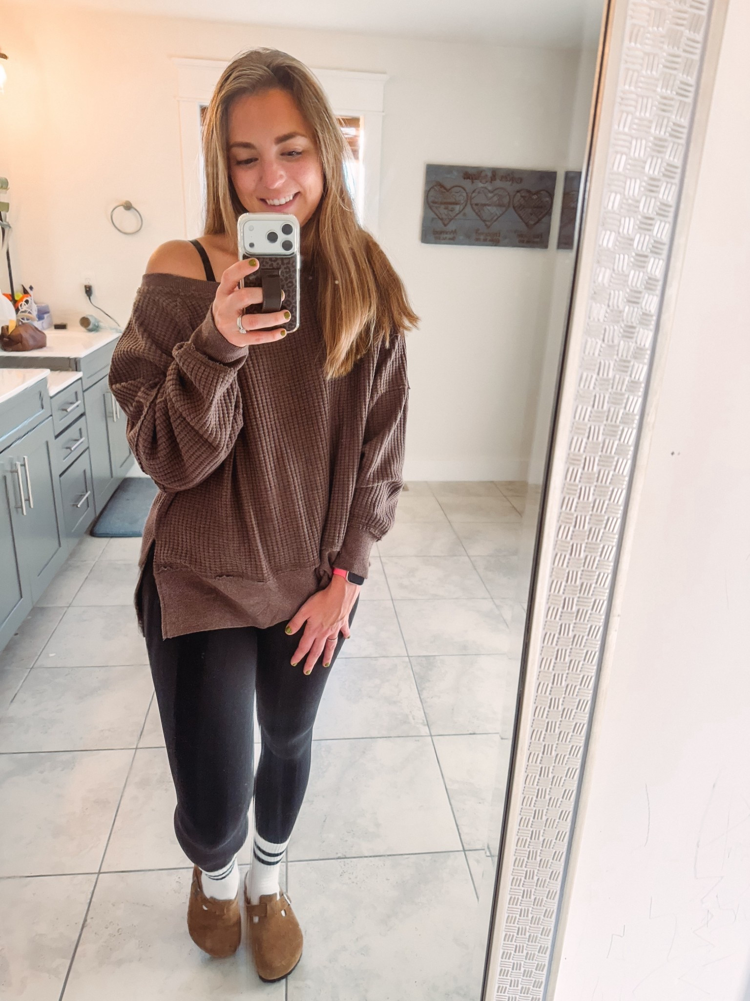 Cozy girl era ☕️✨
Wearing my fave oversized waffle-knit from American Eagle, Athleta leggings that are buttery soft, Amazon crew socks, and my go-to Birkenstock clogs — the ultimate comfy combo for a chilly morning at home or running errands. 🫶🏼
#OOTD #CozyChic #FallStyle #MomOutfit #LTKStyle #LTKFallFashion #AmazonFinds #AmericanEagle #Athleta #Birkenstocks #LTKUnder50 #OutfitInspo #TheLinkedMom

#LTKgrwm #LTKmomlife #LTKootd