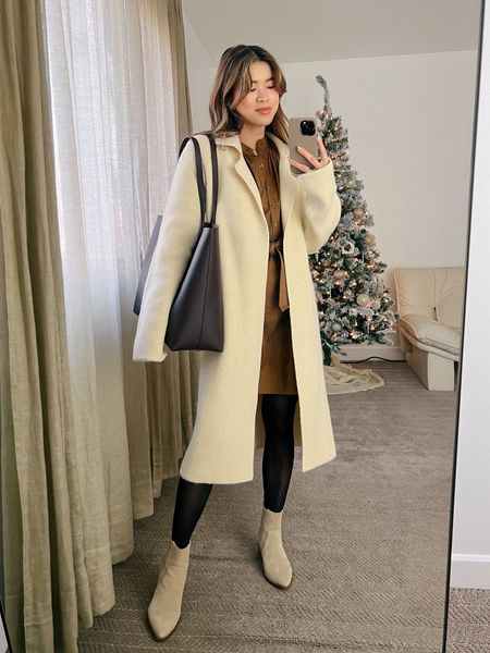 Revolve rust shirtdress layered under long cream coat with Madewell tan western suede booties!

Dress: XXS/XS
Shoes: 6

#winter
#winterfashion
#winterstyle
#winteroutfits
#giftsforher
#madewell
#abercrombie
#revolve 
#boots
#everlane

#LTKHoliday #LTKSeasonal #LTKstyletip