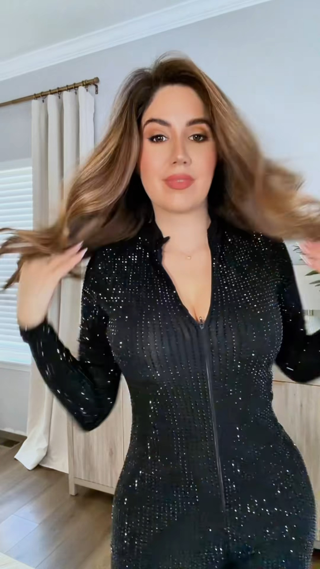 The easiest way to add sparkle to a night look? This thinestone zip-up jumpsuit! 

 #LTKHoliday #LTKootd #LTKSeasonal