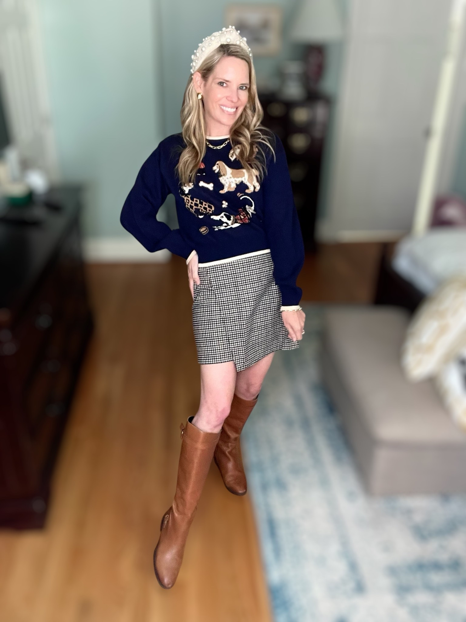 🐾 Preppy & playful fall style! This navy dog graphic sweater from Amazon adds a whimsical touch to any outfit, and I paired it with Old Navy’s high-waisted wrap-front mini skirt for a classic preppy vibe. Tall brown boots keep it polished, while my pearl headband and layered gold jewelry from Melinda Maria (use code PREPPYREBEL for 10% off ✨) elevate the look.

🛍️ Outfit details:
	•	Amazon navy dog graphic sweater 🐶
	•	Old Navy high-waisted wrap-front mini skirt 🖤🤍
	•	Tall brown boots 🤎
	•	Pearl headband + Melinda Maria jewelry ✨

Perfect for: fall gatherings, casual workdays, or a chic weekend look that mixes fun with sophistication.

#preppystyle #ltkfall #amazonfinds #oldnavystyle #melindamaria #falloutfitideas #fallstyle2025


#LTKWorkwear #LTKFindsUnder100 #LTKFindsUnder50