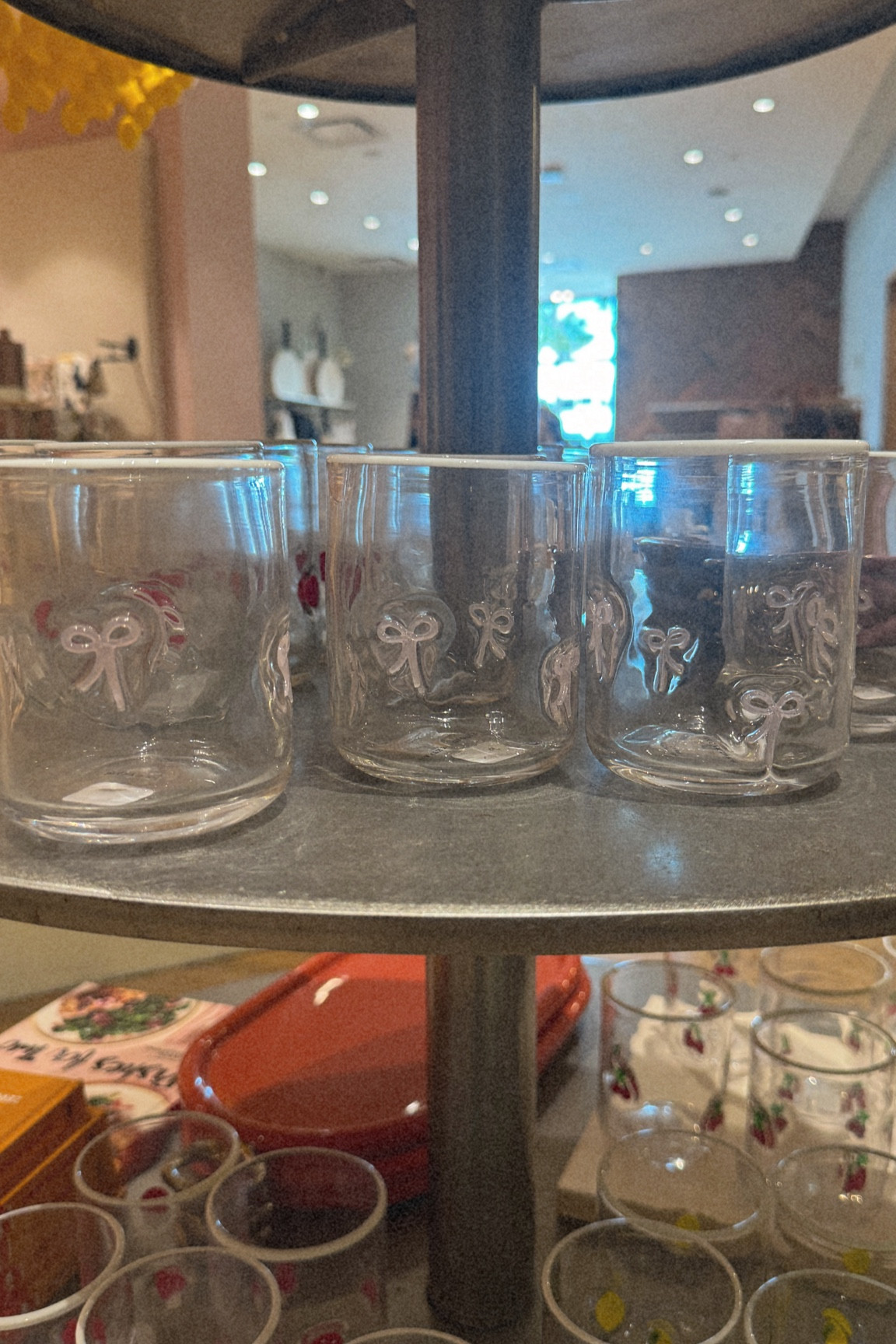 Light pink bow icon juice cups from anthropologies a new drop and I’m obsessed!! 