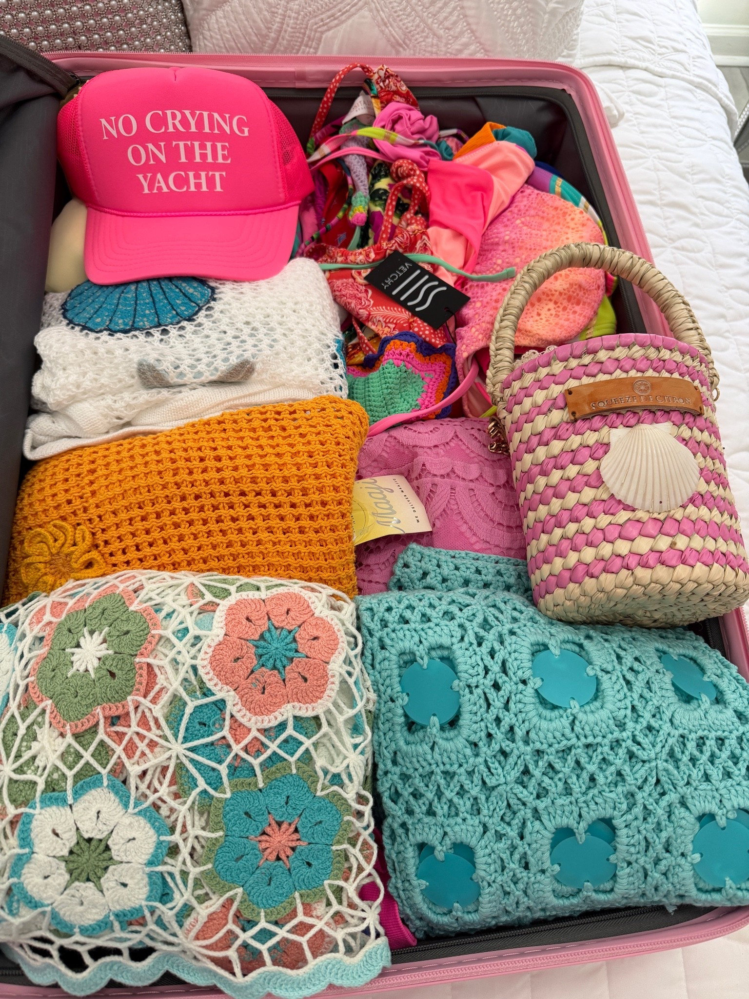 Everything I’ve packed on the right side of my suitcase for the beach is linked!