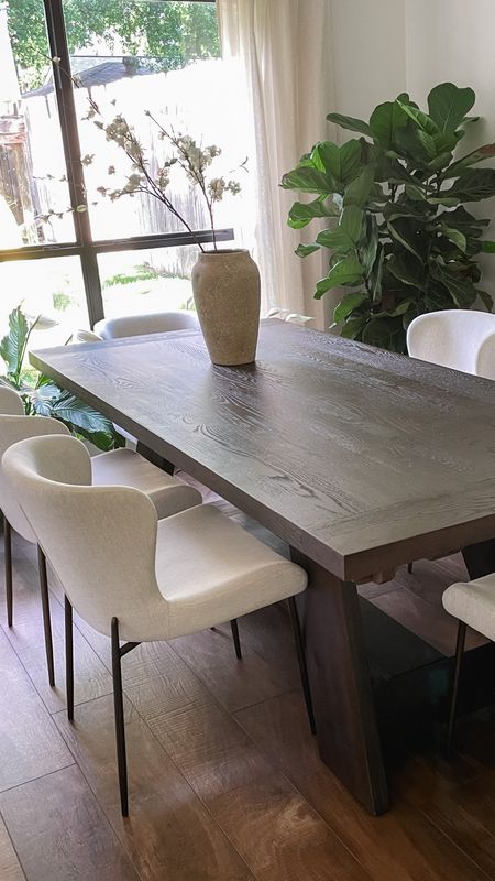 This Arhaus dining room table and chairs are my favorite new additions!!  Also love this vase and Target branches. 

#LTKFind #LTKfamily #LTKhome