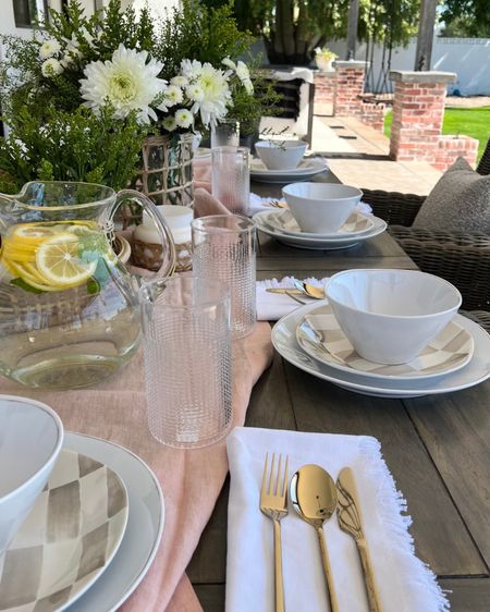 Outdoor table setting inspiration featuring neutral plates and bowls and rattan decor. Perfect for hosting for Mother’s Day this Spring!

#LTKfindsunder100 #LTKfindsunder50 #LTKhome