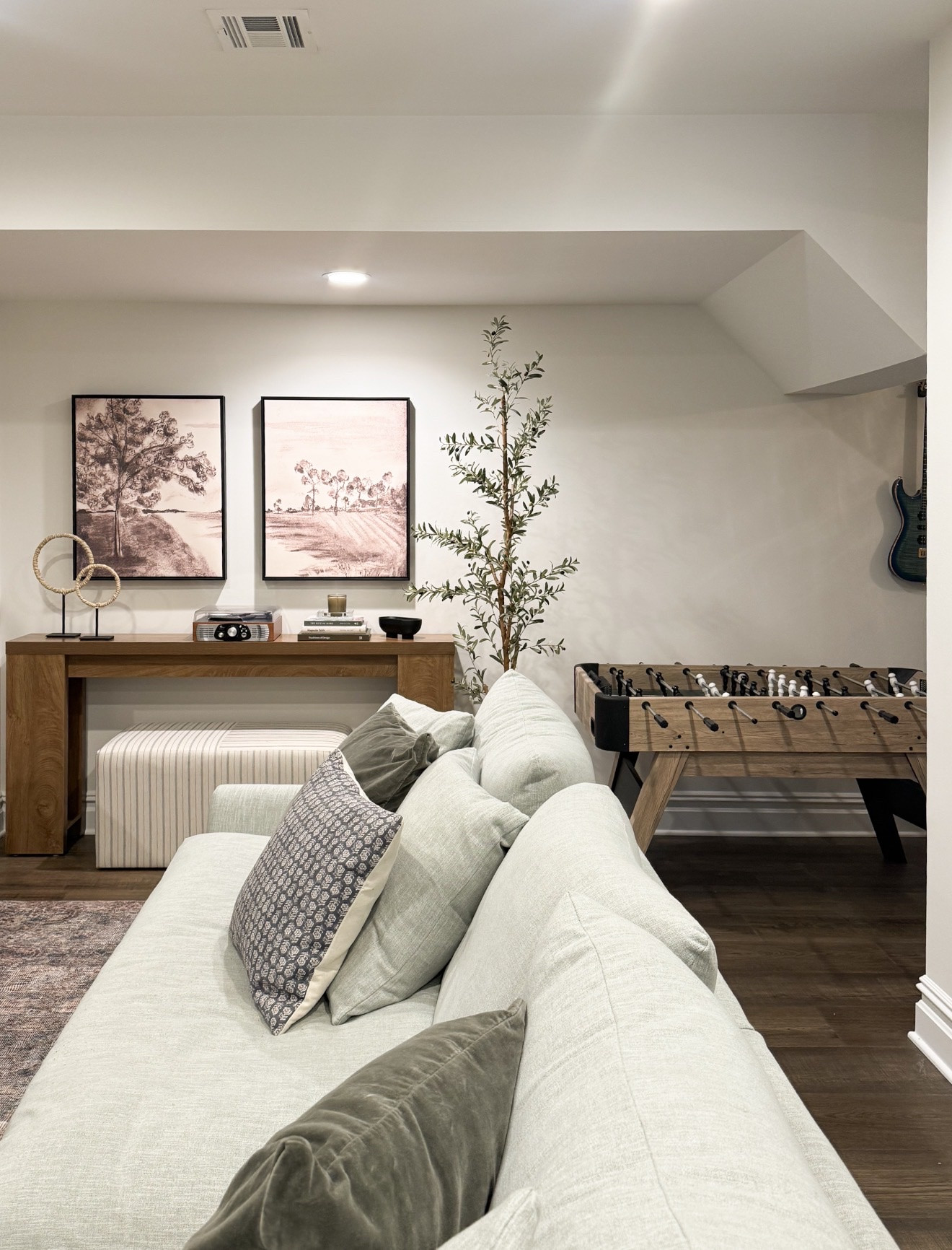 We wanted this area to feel fun but still blend with the rest of the basement. It is such a good mix of function and style for the kids.

basement entertainment area, foosball table setup, family game room ideas, kids friendly spaces, basement hangout area, modern family home, casual living spaces, home entertainment ideas, cozy basement setup, multifunctional spaces, home design inspiration, girlonthehudson

#LTKKids #LTKHome