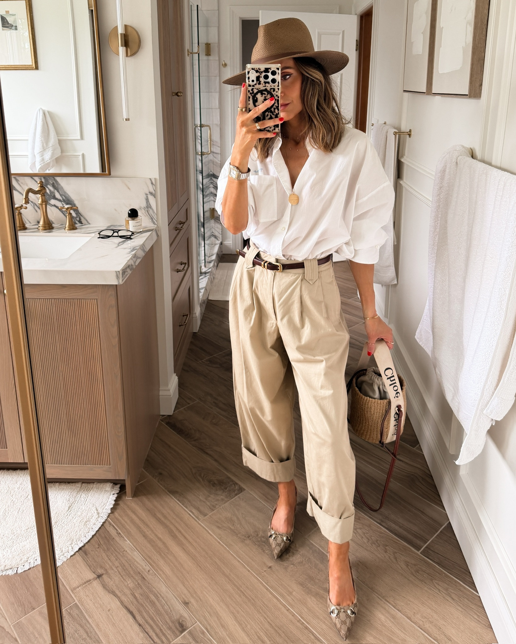 Friday OOTD 🤍🤎 love this look so much I thought it needed a place on the feed! Comment FRIDAY and I’ll send you links ✨ 

Zara pants and mother button up fit oversized and I love the menswear vibe, added a straw hat bc why not?! Love the safari inspired vibe here! Thoughts??

#LTKootd #LTKgrwm #LTKSeasonal